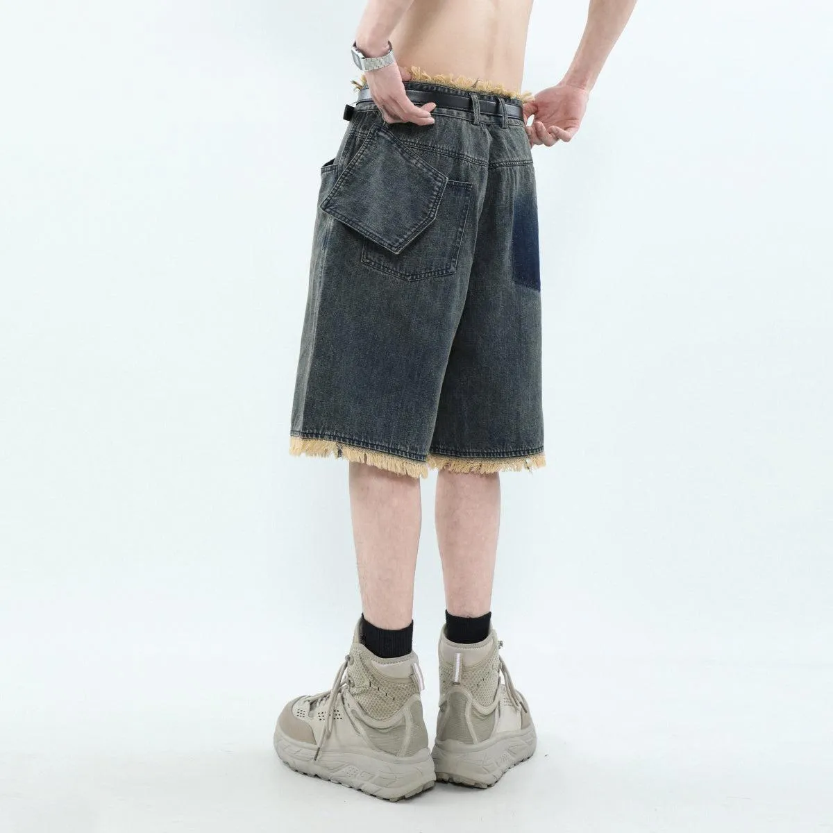 Asymmetric Pocket Tassel Hem Denim Shorts