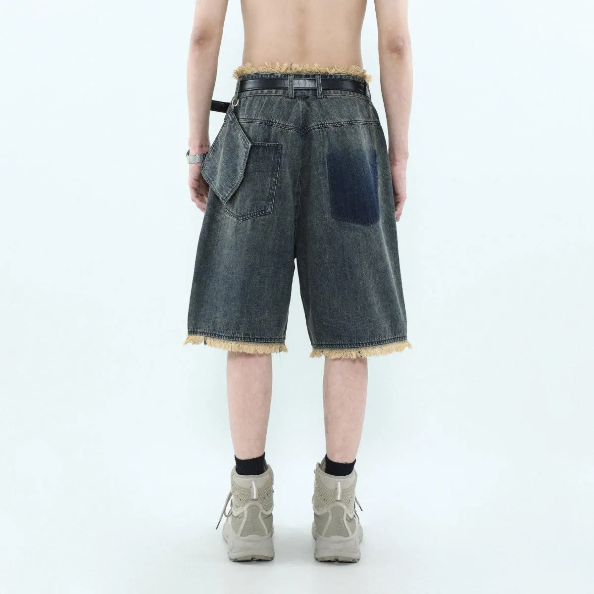 Asymmetric Pocket Tassel Hem Denim Shorts