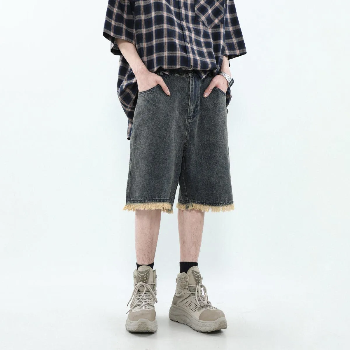 Asymmetric Pocket Tassel Hem Denim Shorts