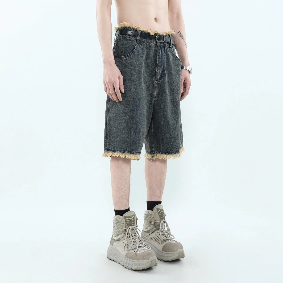 Asymmetric Pocket Tassel Hem Denim Shorts