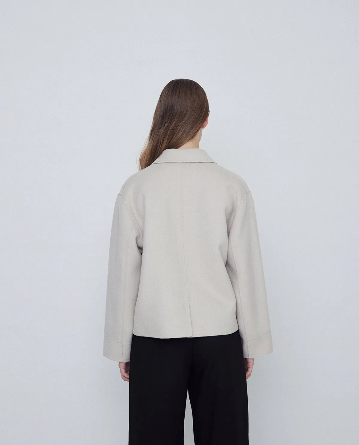 Handmade wool short coat in ecru by YERSE