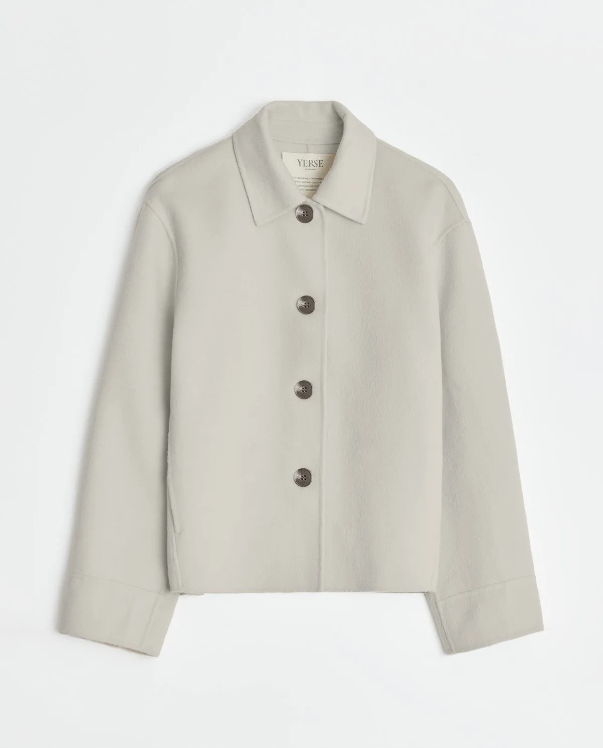Handmade wool short coat in ecru by YERSE